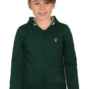 Kids Young boy wearing a dark green zip-up hoodie with a neon green deer logo, gray hood lining, and light wash denim jeans, hands in pockets. Perfect for kids' casual winter wear.