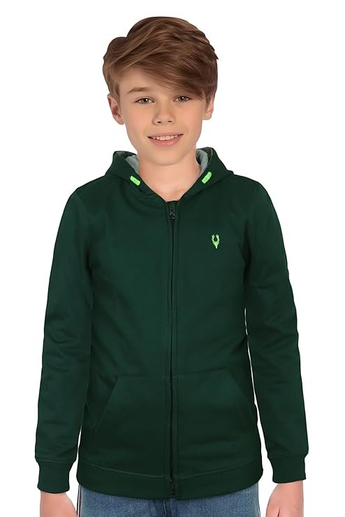 Boys Dark Green Zip Up Hoodie Sweatshirt | Kids Winter Casual Wear Young boy wearing a dark green zip-up hoodie with a neon green deer logo, gray hood lining, and light wash denim jeans, hands in pockets. Perfect for kids' casual winter wear.
